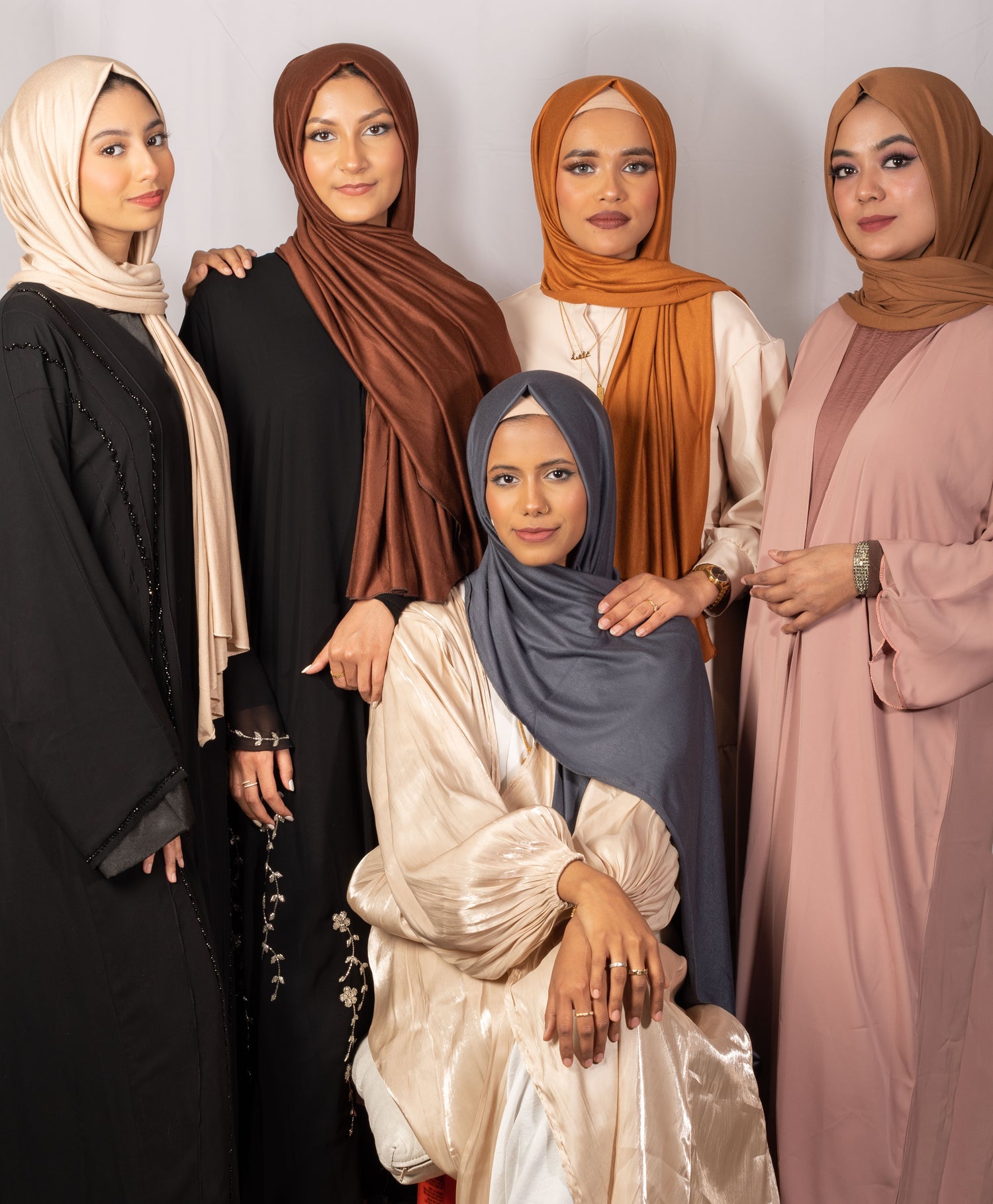 Islamic fashion, Modest clothing, Fragrant candles, Hijab pins collection, Magnetic hijab pins, Stylish scrunchies, Satin-lined undercap, Traditional keffiyeh, Abaya designs, Elegant hijab accessories, Modest wear trends, Hijab fashion essentials